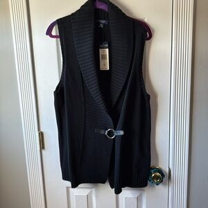 Black sweater vest with buckle . NWT